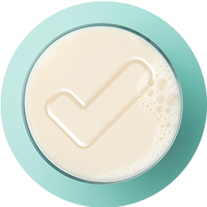 Glas melk met een vinkje